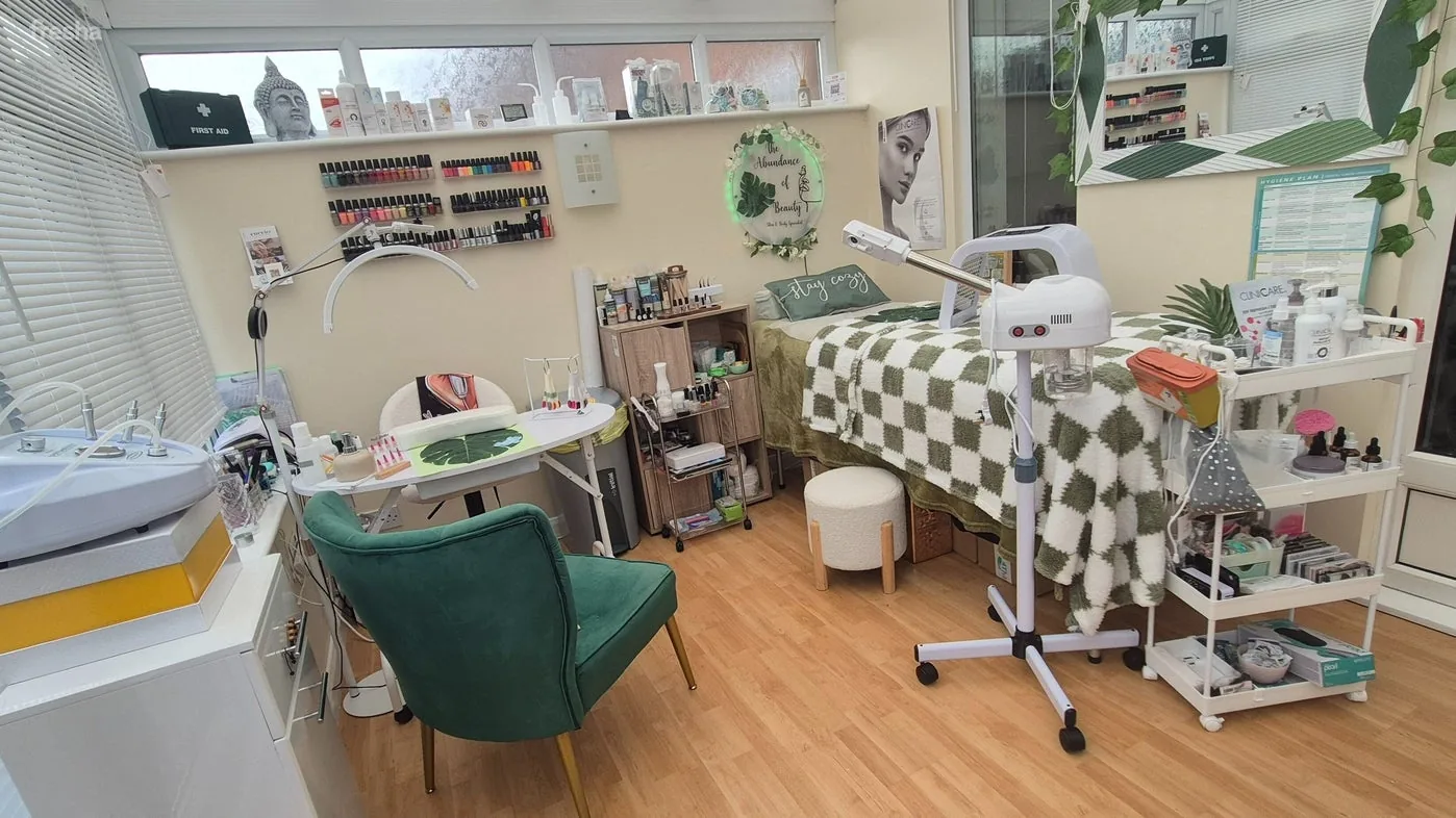 Cozy interior of The Abundance of Beauty in Frimley, England, GB showcasing a wellness treatment room.
