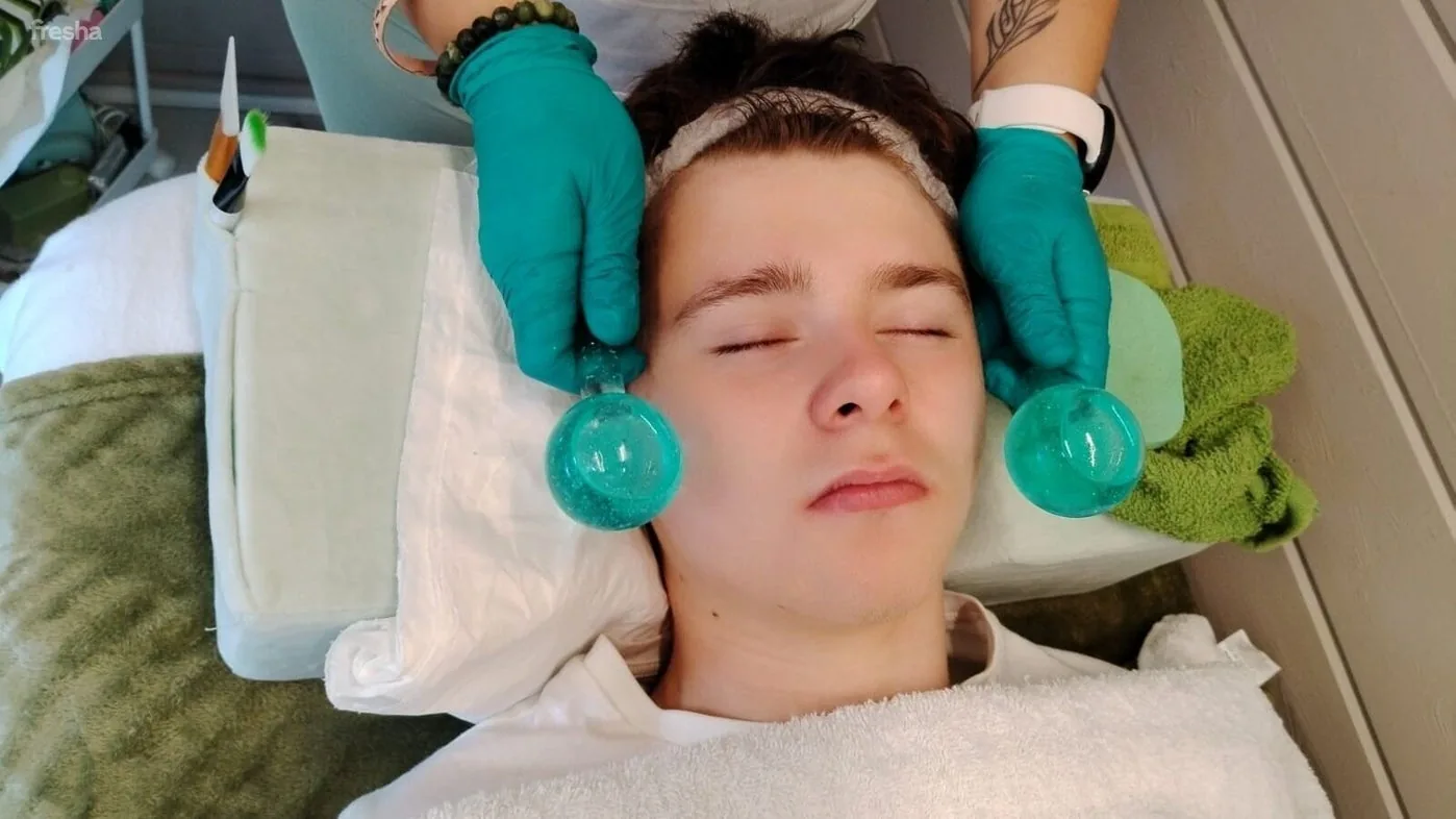 Facial treatment at The Abundance of Beauty, Frimley, England, GB, featuring relaxing blue globes.