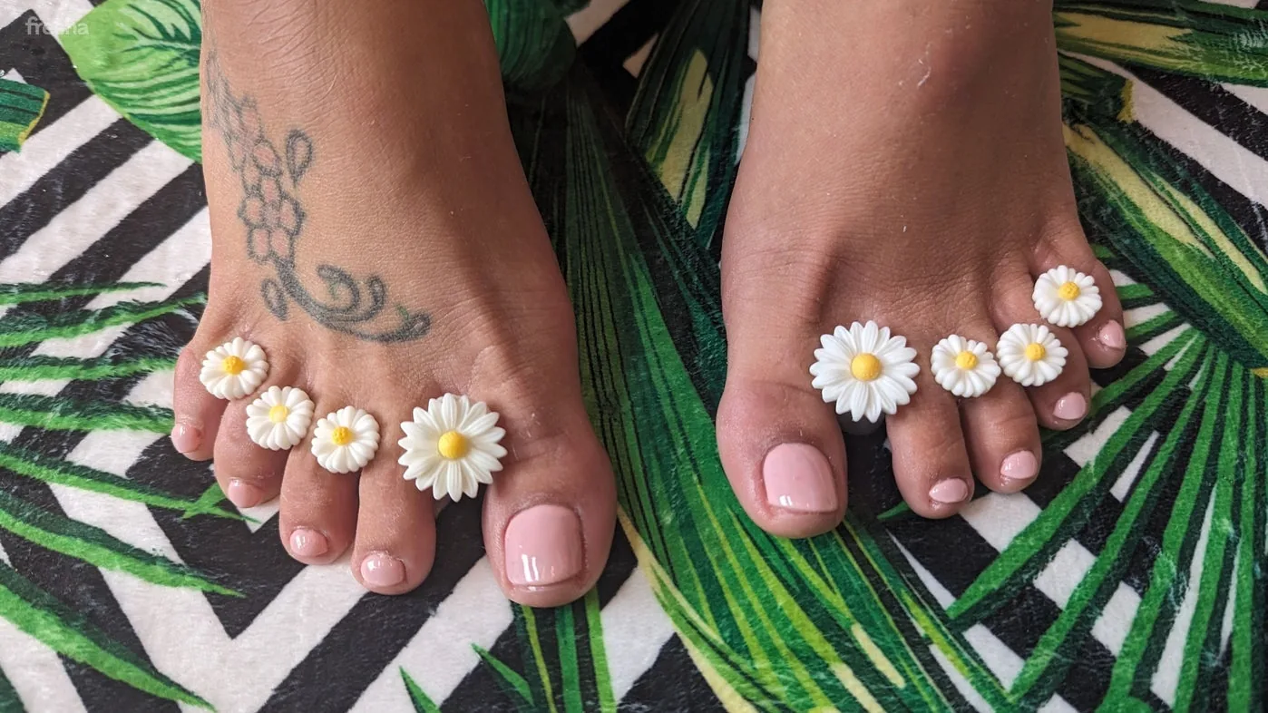 Charming pedicure with white daisies at The Abundance of Beauty, Frimley, England, GB.